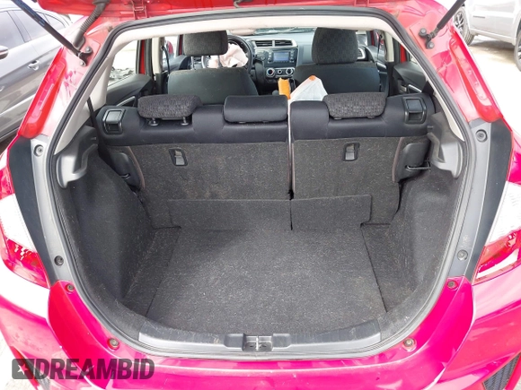 2016 Honda Fit LX with VIN JHMGK5H59GS008911, listed as a IAAI auction lot 42002981 with 96,224 mi miles and . Bid and sale history available at DreamBid. Image 18.