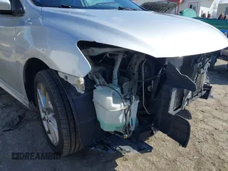 2015 Nissan Sentra S with VIN 3N1AB7AP3FY311829, listed as a IAAI auction lot 41903859 with 181,519 mi miles and . Bid and sale history available at DreamBid. Image 14.