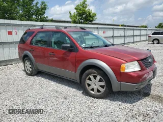 2005 Ford Freestyle SE with VIN 1FMZK01135GA02649, listed as a Copart auction lot 61283605 with 218,219 mi miles and Salvage title. Bid and sale history available at DreamBid. Image 4.