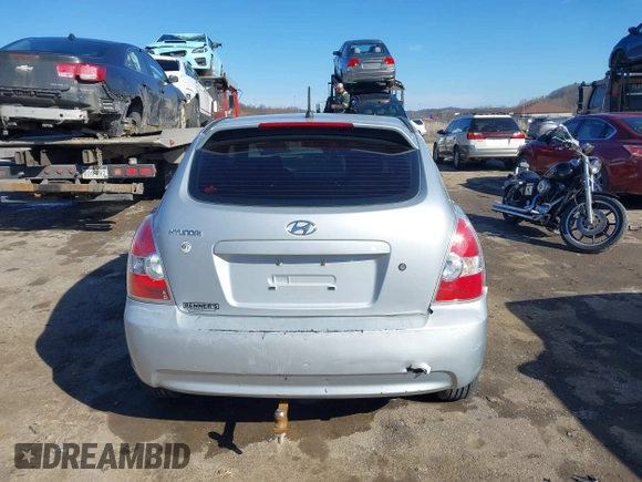 2007 Hyundai Accent GS with VIN KMHCM36C97U043769, listed as a IAAI auction lot 41526011 with 230,566 mi miles. Bid and sale history available at carsss.com. Image 16.