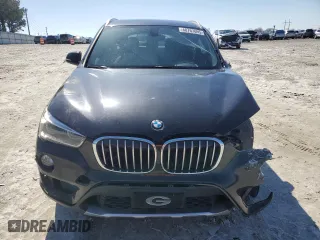 2016 BMW X1 xDrive28i with VIN WBXHT3C32GP884206, listed as a Copart auction lot 48767695 with 112,864 mi miles and Salvage Title. Bid and sale history available at carsss.com. Image 5.