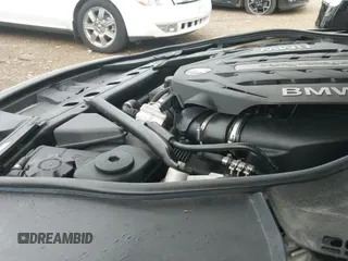 2012 BMW 7 Series 750i xDrive z VIN WBAKC6C58CC396561, wystawiony jako IAAI lot #42700568 z przebiegiem 135 433 mil mil oraz . Historia ofert i sprzedaży dostępna na DreamBid. Obrazek 19.