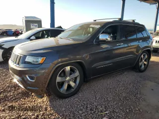 2015 Jeep Grand Cherokee Overland with VIN 1C4RJFCG9FC913962, listed as a Copart auction lot 62030575 with 134,465 mi miles and Clean title. Bid and sale history available at DreamBid. Image 1.