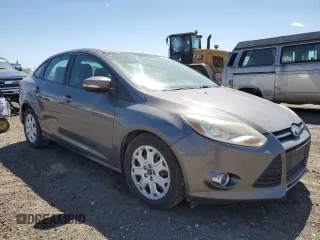2012 Ford Focus SE with VIN 1FAHP3F23CL243982, listed as a Copart auction lot 52801055 with 143,695 mi miles and Salvage Title. Bid and sale history available at carsss.com. Image 4.