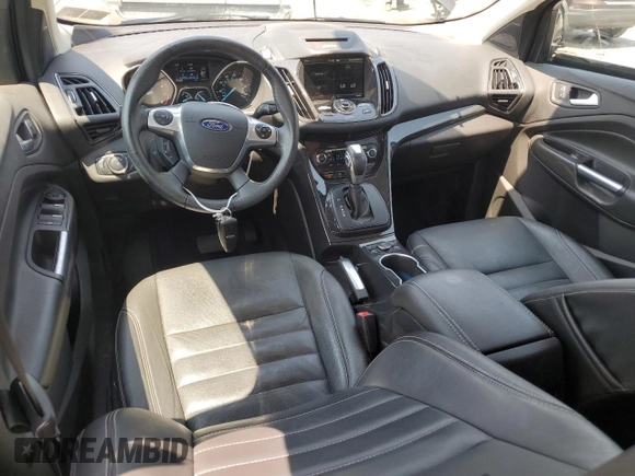 2015 Ford Escape Titanium z VIN 1FMCU9J97FUA38731, wystawiony jako Copart lot #60621085 z przebiegiem 119 704 mil mil oraz Szkoda całkowita • Salvage title. Historia ofert i sprzedaży dostępna na DreamBid. Obrazek 8.