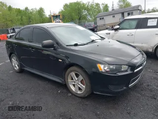 2014 Mitsubishi Lancer SE with VIN JA32V2FW5EU005615, listed as a IAAI auction lot 42204917 with 141,285 mi miles and . Bid and sale history available at carsss.com. Image 1.
