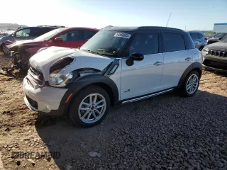 2015 MINI Countryman S with VIN WMWZC5C53FWP44388, listed as a Copart auction lot 54560585 with 67,913 mi miles and Salvage Title. Bid and sale history available at DreamBid. Image 1.