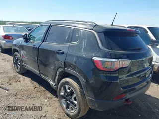 2018 Jeep Compass Trailhawk z VIN 3C4NJDDBXJT238593, wystawiony jako IAAI lot #42075447 z przebiegiem 122 064 mil mil oraz . Historia ofert i sprzedaży dostępna na DreamBid. Obrazek 3.