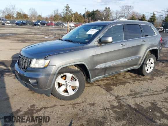 2011 Jeep Grand Cherokee 70th Anniversary with VIN 1J4RR4GT6BC715848, listed as a IAAI auction lot 41562152 with 119,910 mi miles. Bid and sale history available at carsss.com. Image 17.