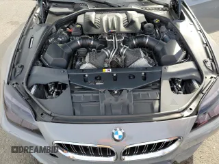 2015 BMW M6 z VIN WBS6C9C58FD467819, wystawiony jako Copart lot #70903944 z przebiegiem 85 596 mil mil oraz Szkoda całkowita • Salvage title. Historia ofert i sprzedaży dostępna na DreamBid. Obrazek 11.