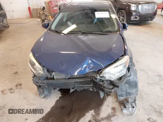2016 Toyota Corolla L with VIN 5YFBURHE3GP438299, listed as a IAAI auction lot 42420601 with 152,373 mi miles and . Bid and sale history available at DreamBid. Image 12.
