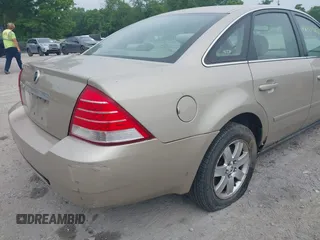 2005 Mercury Montego Luxury z VIN 1MEFM40125G612342, wystawiony jako IAAI lot #42393622 z przebiegiem 248 945 mil mil oraz . Historia ofert i sprzedaży dostępna na DreamBid. Obrazek 12.