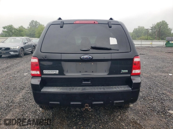 2012 Ford Escape XLT z VIN 1FMCU9DG4CKA23816, wystawiony jako Copart lot #61084425 z przebiegiem Nie podano mil oraz Szkoda całkowita • Salvage title. Historia ofert i sprzedaży dostępna na DreamBid. Obrazek 6.