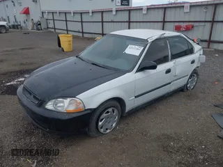 1998 Honda Civic DX with VIN 2HGEJ6629WH551418, listed as a IAAI auction lot 42137262 with 180,704 mi miles. Bid and sale history available at carsss.com. Image 18.