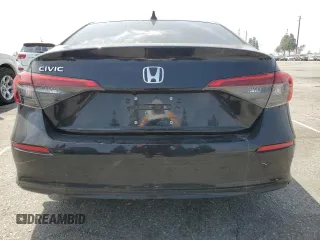 2024 Honda Civic LX z VIN 2HGFE2F23RH572531, wystawiony jako Copart lot #52685515 z przebiegiem 14 750 mil mil oraz Szkoda całkowita • Salvage title. Historia ofert i sprzedaży dostępna na DreamBid. Obrazek 6.