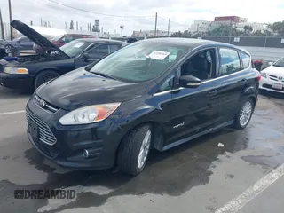 2013 Ford C-Max SEL with VIN 1FADP5BU4DL544750, listed as a IAAI auction lot 42258705 with 209,330 mi miles and . Bid and sale history available at DreamBid. Image 2.