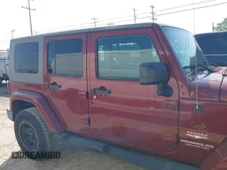 2008 Jeep Wrangler Unlimited Sahara z VIN 1J4GA59168L551896, wystawiony jako IAAI lot #42173185 z przebiegiem 192 394 mil mil oraz . Historia ofert i sprzedaży dostępna na DreamBid. Obrazek 13.
