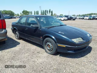1994 Saturn SL z VIN 1G8ZJ557XRZ269410, wystawiony jako IAAI lot #31653894 z przebiegiem 132 202 mil mil oraz . Historia ofert i sprzedaży dostępna na DreamBid. Obrazek 1.