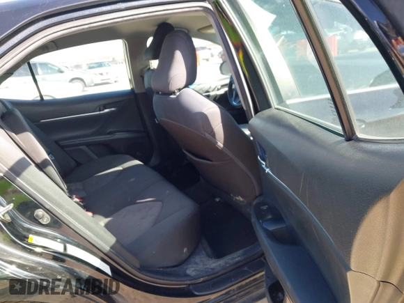 2019 Toyota Camry LE z VIN 4T1B11HK8KU197444, wystawiony jako IAAI lot #41710904 z przebiegiem 137 766 mil mil oraz . Historia ofert i sprzedaży dostępna na DreamBid. Obrazek 8.