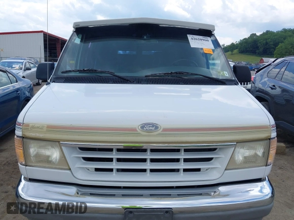 1994 Ford Econoline Cargo with VIN 1FDEE14N0RHA00870, listed as a IAAI auction lot 42620960 with 107,662 mi miles and . Bid and sale history available at DreamBid. Image 6.