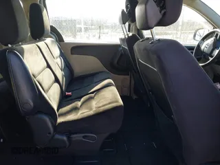 2014 Dodge Grand Caravan American Value with VIN 2C4RDGBG7ER422178, listed as a IAAI auction lot 41352312 with 176,415 mi miles and . Bid and sale history available at DreamBid. Image 8.