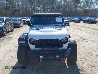 2022 Jeep Wrangler Unlimited Rubicon z VIN 1C4JJXFGXNW121489, wystawiony jako IAAI lot #41749550 z przebiegiem 56 601 mil mil oraz . Historia ofert i sprzedaży dostępna na DreamBid. Obrazek 13.