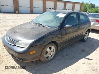 2006 Ford Focus S z VIN 1FAFP31N76W249134, wystawiony jako IAAI lot #41951073 z przebiegiem 152 065 mil mil oraz . Historia ofert i sprzedaży dostępna na DreamBid. Obrazek 20.