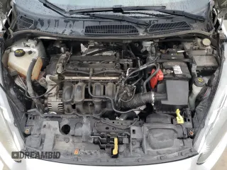 2016 Ford Fiesta SE z VIN 3FADP4BJ4GM203626, wystawiony jako Copart lot #54674475 z przebiegiem 127 194 mil mil oraz Szkoda całkowita • Salvage title. Historia ofert i sprzedaży dostępna na DreamBid. Obrazek 11.