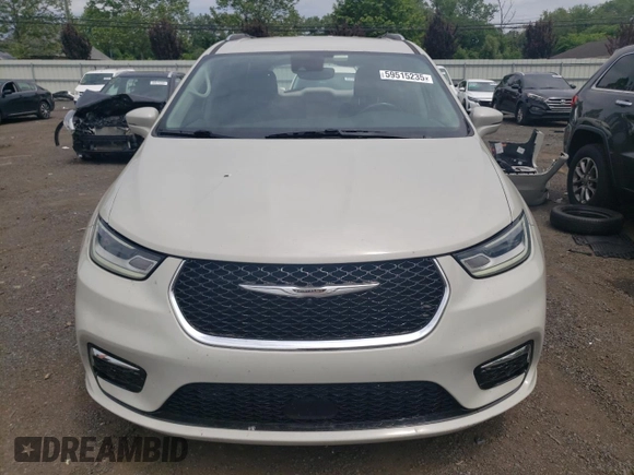 2021 Chrysler Pacifica Touring L with VIN 2C4RC1BGXMR559226, listed as a Copart auction lot 59515235 with 61,219 mi miles and Salvage title. Bid and sale history available at DreamBid. Image 5.