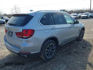 2018 BMW X5 xDrive35i with VIN 5UXKR0C51J0X92651, listed as a IAAI auction lot 41724974 with 83,496 mi miles. Bid and sale history available at carsss.com. Image 4.
