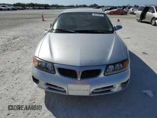 2003 Pontiac Bonneville SE z VIN 1G2HX54K534151957, wystawiony jako Copart lot #45339075 z przebiegiem 172 969 mil mil oraz Nie do naprawy • Non repairable. Historia ofert i sprzedaży dostępna na DreamBid. Obrazek 5.
