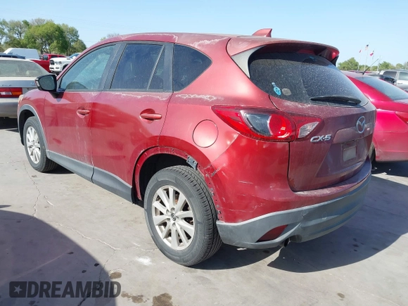 2013 Mazda CX-5 Touring with VIN JM3KE2CE9D0117750, listed as a IAAI auction lot 41858518 with 90,610 mi miles and . Bid and sale history available at carsss.com. Image 3.
