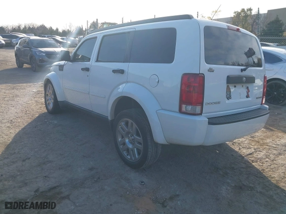 2011 Dodge Nitro Heat with VIN 1D4PT4GK0BW582589, listed as a IAAI auction lot 41015035 with 130,098 mi miles. Bid and sale history available at carsss.com. Image 3.