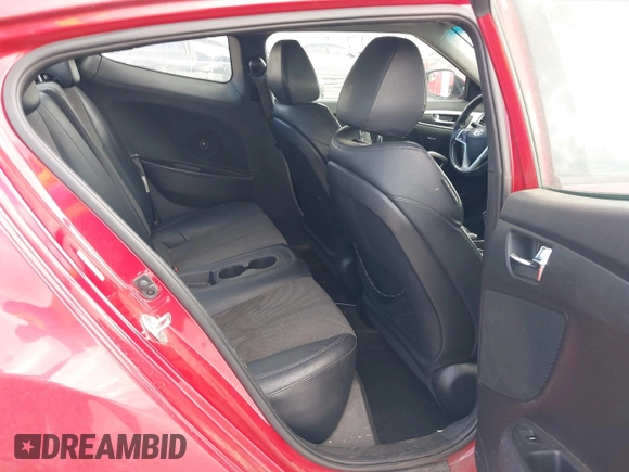 2015 Hyundai Veloster z VIN KMHTC6AD8FU227474, wystawiony jako IAAI lot #42188164 z przebiegiem 122 485 mil mil oraz . Historia ofert i sprzedaży dostępna na DreamBid. Obrazek 8.