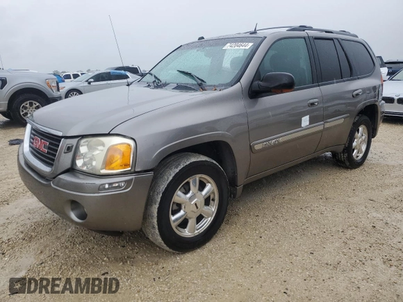 2005 GMC Envoy SLT with VIN 1GKDT13S452307702, listed as a Copart auction lot 74204644 with 0 mi miles and Salvage Title. Bid and sale history available at carsss.com. Image 1.
