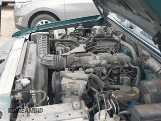 1999 Ford Explorer XL with VIN 1FMZU34X7XZB05866, listed as a IAAI auction lot 41083302 with 198,148 mi miles and . Bid and sale history available at DreamBid. Image 19.