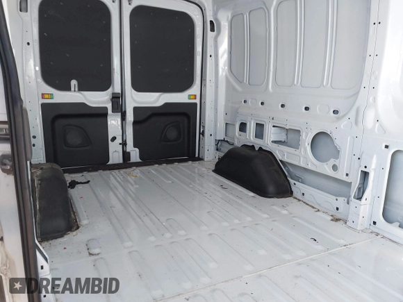 2023 Ford Transit Cargo with VIN 1FTBR1C89PKC07197, listed as a IAAI auction lot 42228682 with 39,306 mi miles and . Bid and sale history available at DreamBid. Image 8.