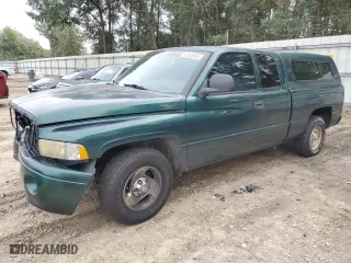 1999 Dodge Ram 1500 with VIN 3B7HC13Y6XG163338, listed as a Copart auction lot 67640594 with 207,847 mi miles and Salvage Title. Bid and sale history available at carsss.com. Image 1.