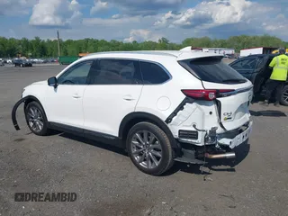 2021 Mazda CX-9 Grand Touring z VIN JM3TCBDY2M0541290, wystawiony jako IAAI lot #42216643 z przebiegiem 38 661 mil mil oraz . Historia ofert i sprzedaży dostępna na DreamBid. Obrazek 14.