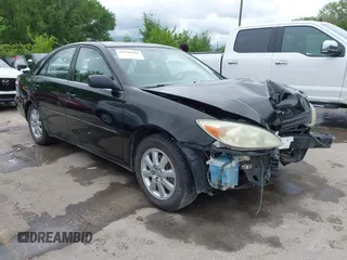 2003 Toyota Camry LE z VIN JTDBF30K730151254, wystawiony jako IAAI lot #42145644 z przebiegiem 182 036 mil mil oraz . Historia ofert i sprzedaży dostępna na DreamBid. Obrazek 1.