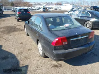 2002 Honda Civic EX with VIN 2HGES26842H549564, listed as a IAAI auction lot 41449790 with 137,844 mi miles. Bid and sale history available at carsss.com. Image 3.
