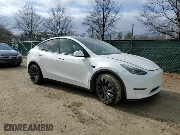 2022 Tesla Model Y Performance with VIN 7SAYGDEF7NF311990, listed as a Copart auction lot 43705395 with 25,651 mi miles and Salvage Title. Bid and sale history available at DreamBid. Image 10.