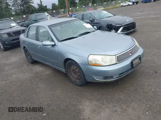 2003 Saturn LS z VIN 1G8JW54R03Y573151, wystawiony jako IAAI lot #42281639 z przebiegiem 137 501 mil mil oraz . Historia ofert i sprzedaży dostępna na DreamBid. Obrazek 1.