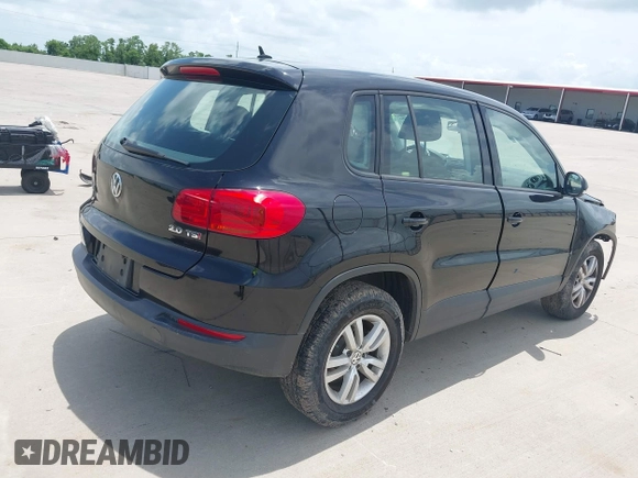 2014 Volkswagen Tiguan SE with VIN WVGAV3AX7EW549326, listed as a IAAI auction lot 42515906 with 102,221 mi miles and . Bid and sale history available at DreamBid. Image 4.