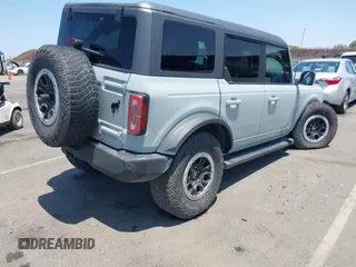2022 Ford Bronco with VIN 1FMEE5DP6NLB34962, listed as a IAAI auction lot 42432037 with 101,044 mi miles and . Bid and sale history available at DreamBid. Image 4.