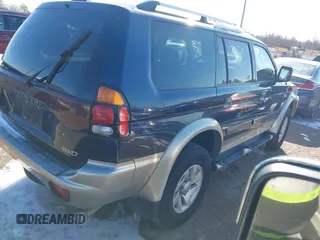 2004 Mitsubishi Montero Sport XLS with VIN JA4MT31R34J008532, listed as a IAAI auction lot 41588402 with 113,546 mi miles. Bid and sale history available at carsss.com. Image 4.