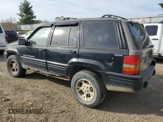 1998 Jeep Grand Cherokee Laredo with VIN 1J4GZ48YXWC299827, listed as a Copart auction lot 76898264 with 232,656 mi miles and Clean Title. Bid and sale history available at carsss.com. Image 2.