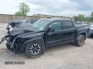 2023 Toyota Tacoma SR with VIN 3TMCZ5AN2PM598464, listed as a IAAI auction lot 42238032 with 35,597 mi miles and . Bid and sale history available at DreamBid. Image 17.
