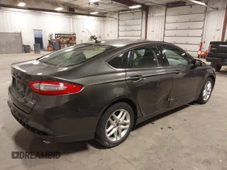 2016 Ford Fusion SE with VIN 1FA6P0HDXG5103054, listed as a IAAI auction lot 41823043 with 71,303 mi miles and . Bid and sale history available at DreamBid. Image 4.