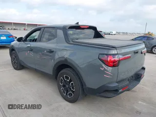 2022 Hyundai Santa Cruz SEL with VIN 5NTJBDAE4NH022823, listed as a IAAI auction lot 42051616 with 23,158 mi miles and . Bid and sale history available at DreamBid. Image 3.